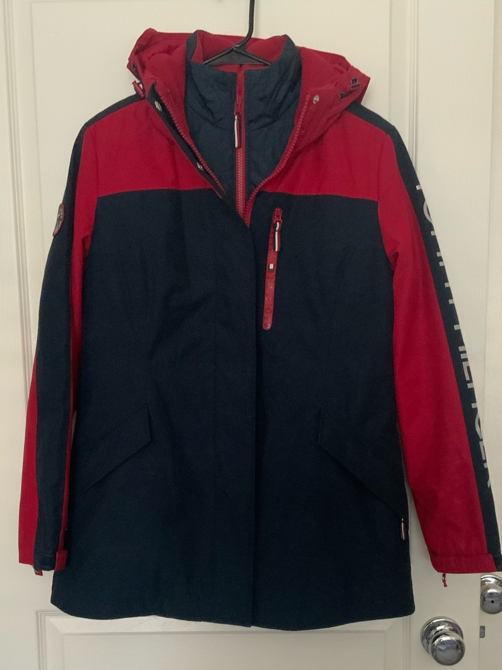 Two Tommy Hilfiger three-in-one all-weather hooded ski jackets